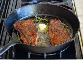 steak in cast iron skillet.jfif